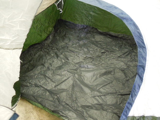 Used Ozark Trail 4 Person Instant Tent with Rain Cover, Stakes, and Carry Bag