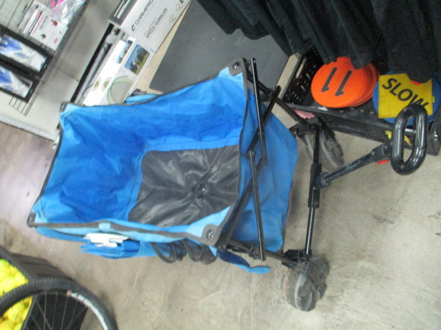 Load image into Gallery viewer, Used ozark trail Blue Wheeled Wagon
