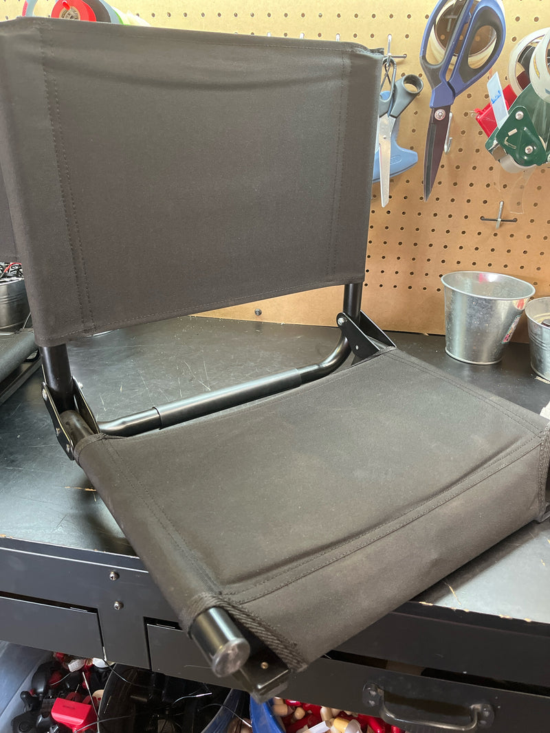 Load image into Gallery viewer, Used black folding stadium chair
