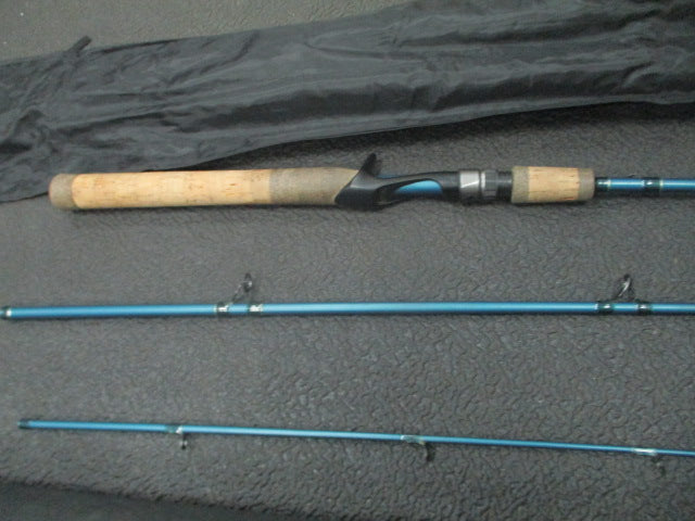 Load image into Gallery viewer, Used Cabelas salt Striker 7 Foot Spinning Rod  With Case
