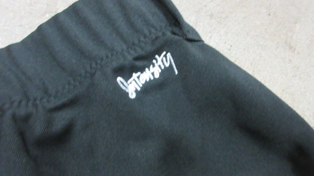 Load image into Gallery viewer, Used Intensity Youth Small Elastic Softball Pants
