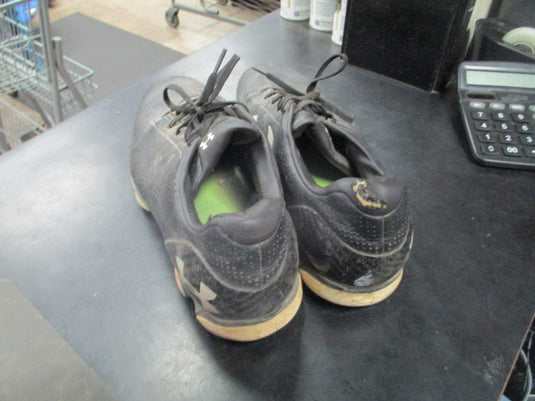 Used Under Amour Cleats in black size 11 wear to bottom spikes
