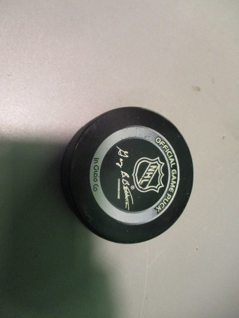 Load image into Gallery viewer, Used Calgary Flames Official NHL Puck
