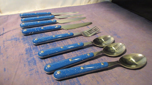 Load image into Gallery viewer, Used Ozark Trail Dinnerware Set - missing 3 forks, 1 spoon, and cup wear
