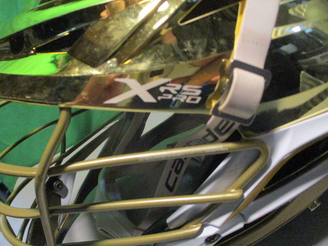 Load image into Gallery viewer, Used Cascade XRS Pro Metallic Gold Adjustable Lacrosse Helmet
