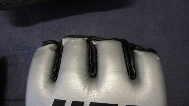 Load image into Gallery viewer, Used The Ultimate UFC MMA Gloves Size Large - heavily worn
