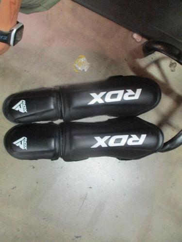 Used RDX T1 Black Size Small Shin Instep Guards (Has wear)