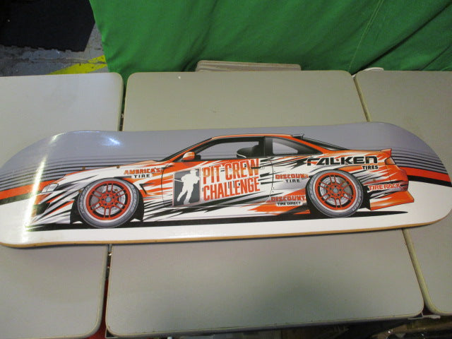 Load image into Gallery viewer, Pit Crew Challenge Discount Tire 33&quot; Skateboard Deck
