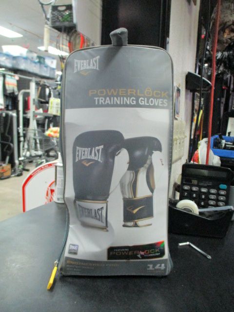 Load image into Gallery viewer, Used Everlast Powerlock Training Gloves in black and gold 14 oz
