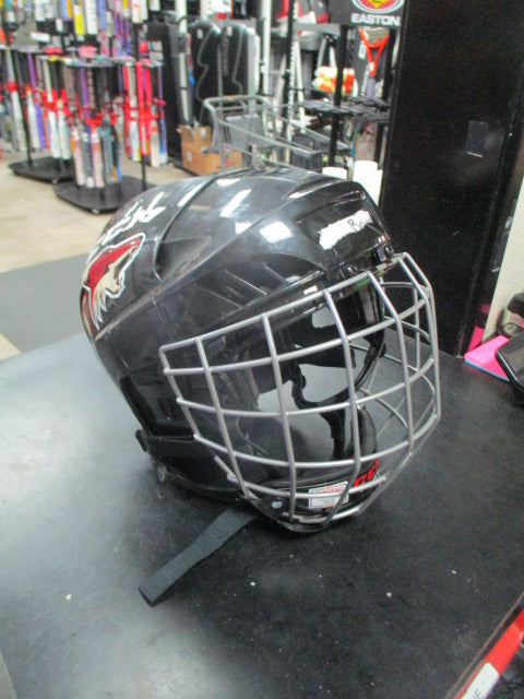 Load image into Gallery viewer, Used CCM Fitlite 40 black hockey helmet with matching face cage
