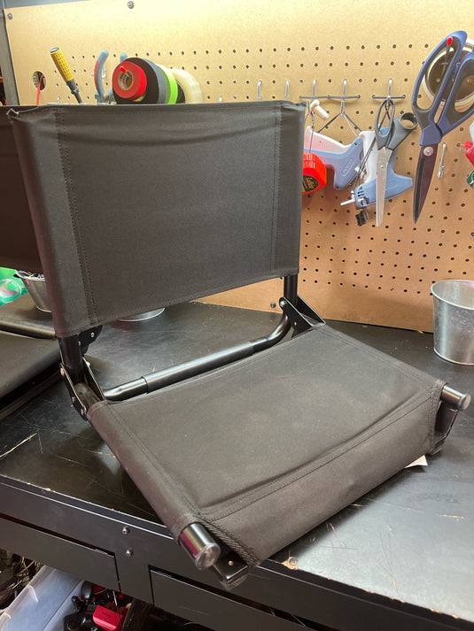 used black folding stadium chair