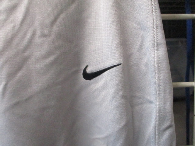 Load image into Gallery viewer, Used Nike Open Bottom Pants Youth Size Large - stained knees

