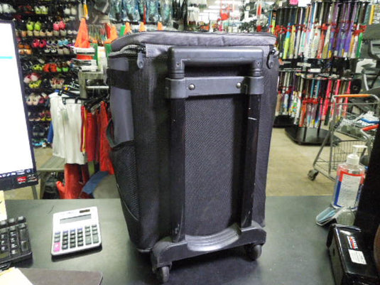 Used Coleman Wheeled Cooler with Stoarge Pockets