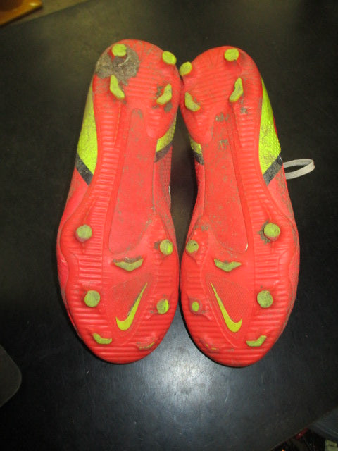 Used Nike Phantom youth Soccer cleats in white size 6Y Spikes are worn down