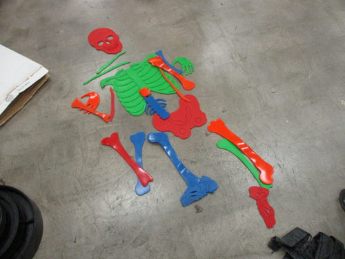 Used Poly Enterprises Rubber Bone Puzzle