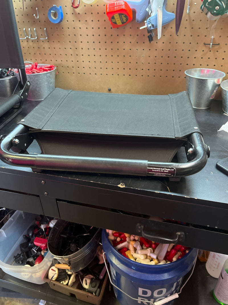 Load image into Gallery viewer, Used black folding stadium chair
