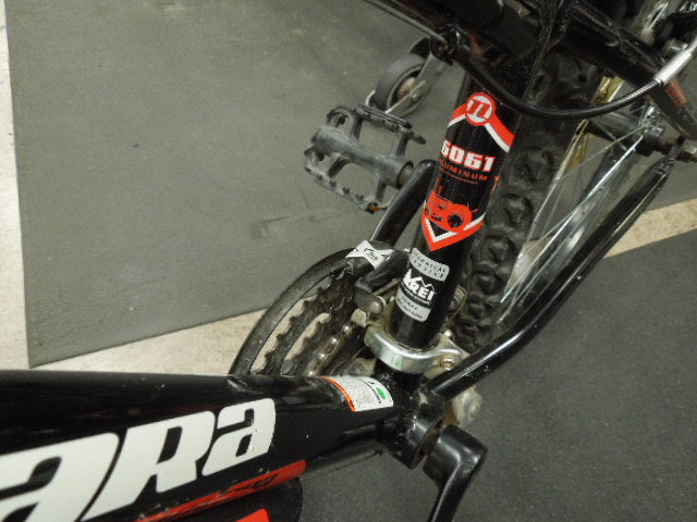 Load image into Gallery viewer, Used Novara Tractor 24 Kid's Mountain Bike with Spinner Fork in Black and Red
