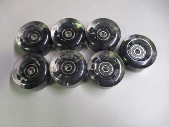 Load image into Gallery viewer, Used Pack of 7 78A Light-Up Rollerskate Wheels w/ ABEC 9 Bearings (missing 1)
