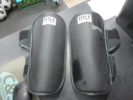 Used Title MMA Shin Guards Size Medium (Has slight wear on shin)