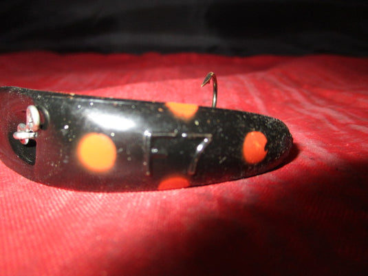 Used Yakima Bait Flatfish Lure - Black with Orange Spots