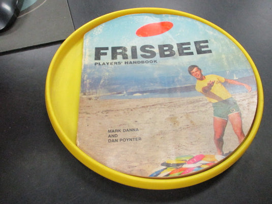 Used Official Firsbee Disc with Player's Handbook
