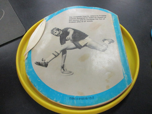 Used Official Firsbee Disc with Player's Handbook
