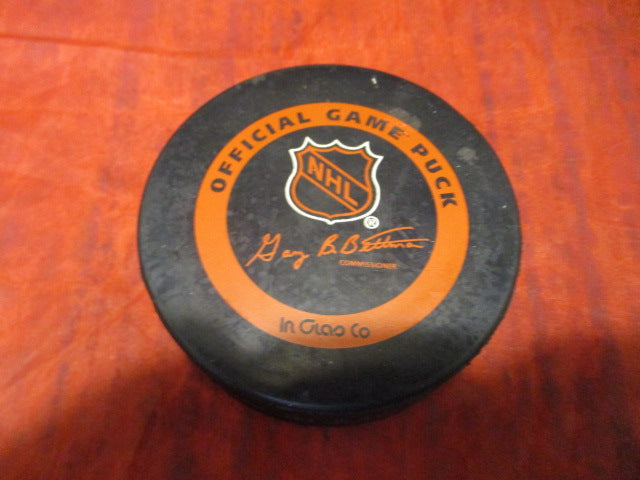 Load image into Gallery viewer, Used Vancouver Canucks NHL Official Game Hockey Puck
