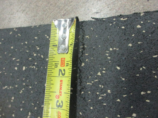 Used 6.5 Foot x 2.5 Foot x 8mm Rubber Flooring (HAS SMALL RIP)