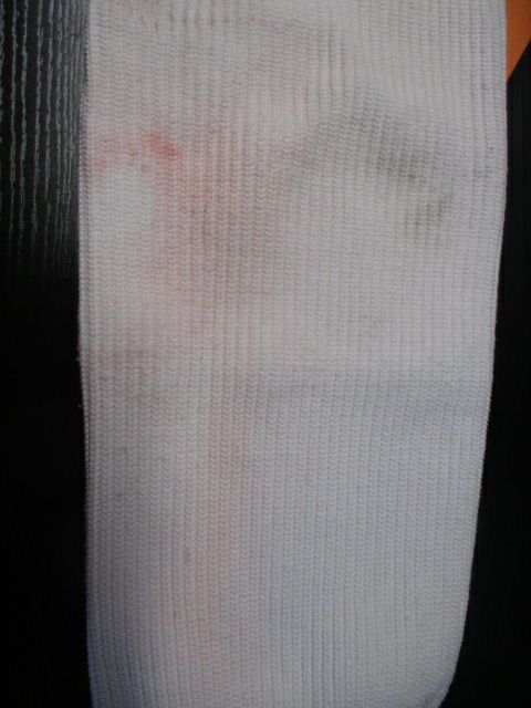 Used White Hockey Socks - red stain
