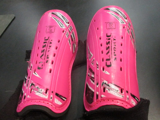 Used Classic Sports Pink Youth Small Soccer Shin Guards (Worn Straps)